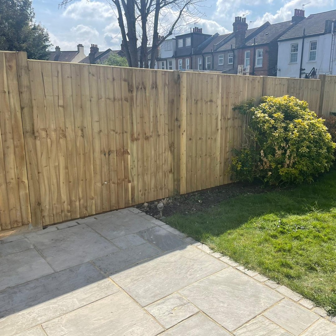 New wooden fence installation