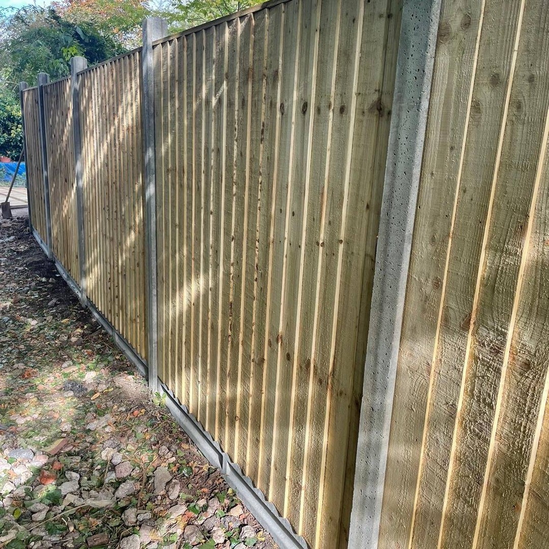 Newly installed wooden fence and posts